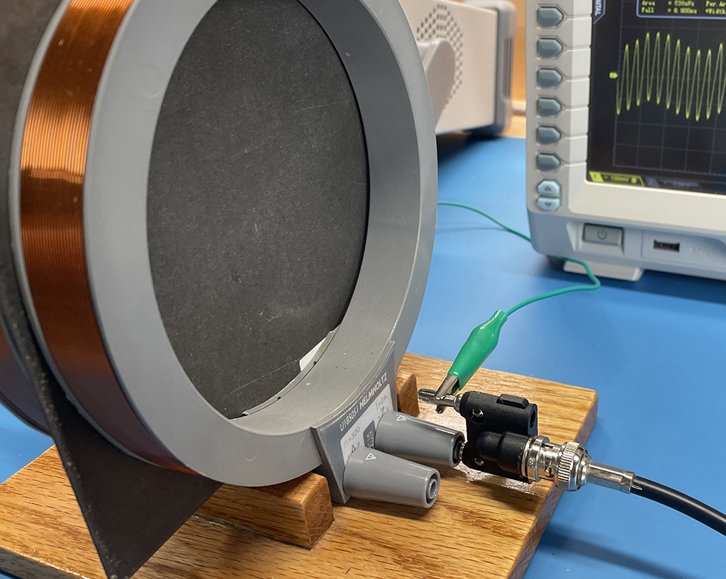 coil fixture configured for an electric-field shielding measurement