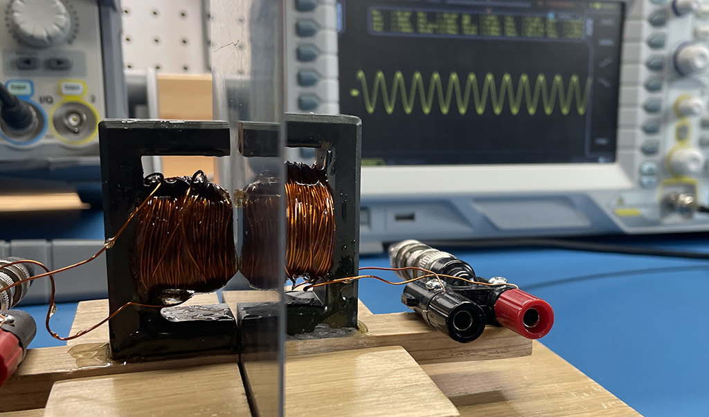 A magnetic field shielding test fixture that minimizes the amount of air in the path of the magnetic flux.