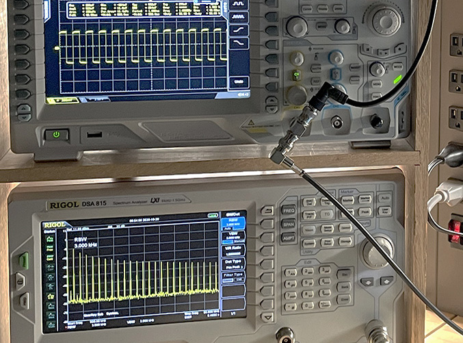 oscilloscope and spectrum analyzer display of 1-MHz square wave
