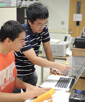 EMC Students Reviewing a Board Layout